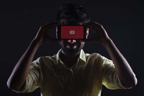 mobile phone man holding black Android smartphone wise